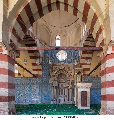 Cairo, Egypt - January 8 2019: Blue, Iznik Ceramic Tiles Wall With Engraved Mihrab (niche) And Decor