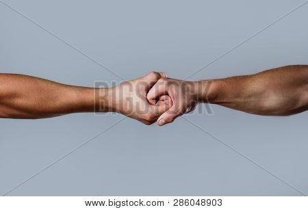 Two Hands, Isolated Arm, Helping Hand Of A Friend. Friendly Handshake, Friends Greeting. Rescue, Hel