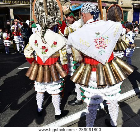 Verin, Spain, 24 Feb 2019. Famous Carnival And Street Parade With Cigarrons Costumes. Ourense Provin
