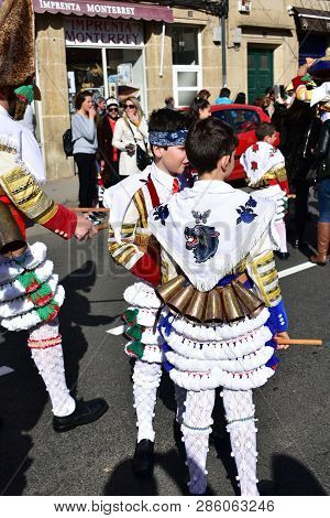 Verin, Spain, 24 Feb 2019. Famous Carnival And Street Parade With Cigarrons Costumes. Ourense Provin