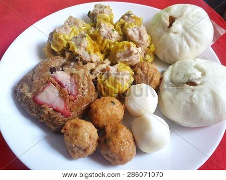 Chinese Food Style, Top View Of Pork Chinese Steamed Dumpling (shumai), Pork Bun, Shrimp Ball And St