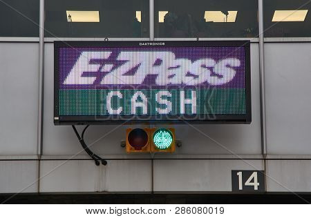 New York, Usa - December 14, 2018: Ezpass Sign And Terminal. E Zpass Is Electronic Toll Collection S
