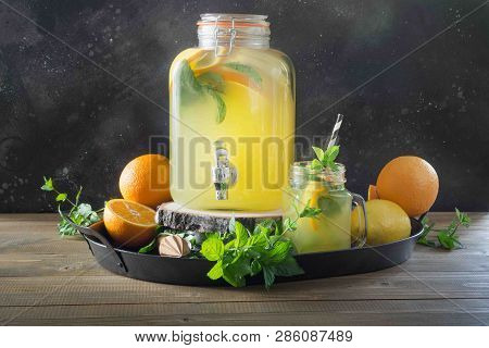 Lemonade With Orange, Lemon And Mint In Mason Jar. Summer Detox Drink.