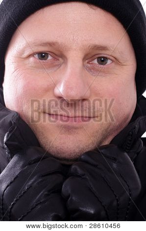 Mann mit Noppe cap ein Handschuhe