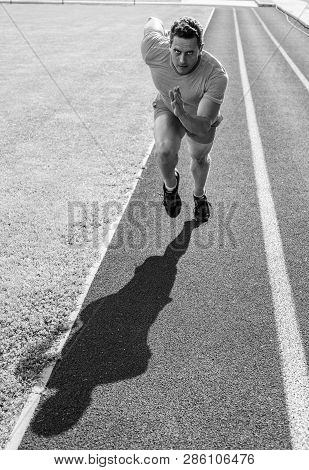 Runner Take Part Competition Motion Forward. Focused On Sport Goal. Ready To Achieve Victory. Man At