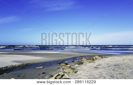 Fresh Water Stream Going Into The Baltic Sea In Winter - Lubiatowo, Pomerania, Poland