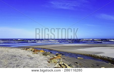 Fresh Water Stream Going Into The Baltic Sea In Winter - Lubiatowo, Pomerania, Poland