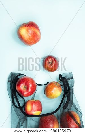 Top View Of Apples In A Reusable String Bag. Sustainable Eco Packaging Concept: Shopping For Groceri