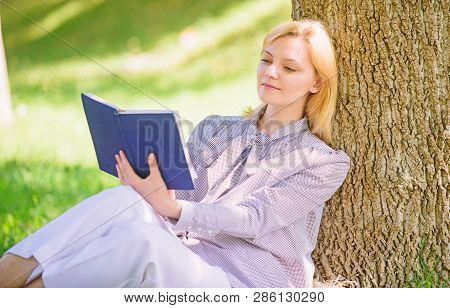 Female Self Improvement. Girl Lean On Tree While Relax In Park Sit Grass. Self Improvement Book. Sel