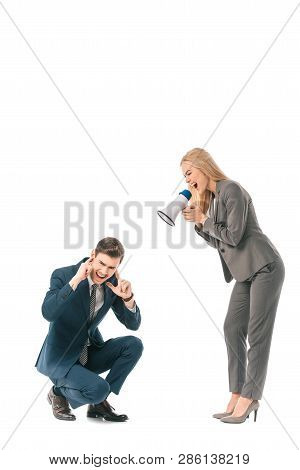 Angry Female Boss Yelling Into Megaphone At Stressed Businessman Isolated On White