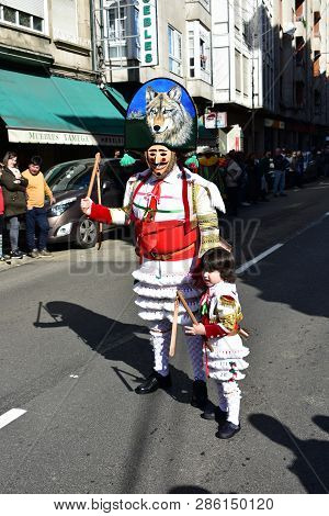 Verin, Spain, 24 Feb 2019. Famous Carnival And Street Parade With Cigarrons Costumes. Ourense Provin
