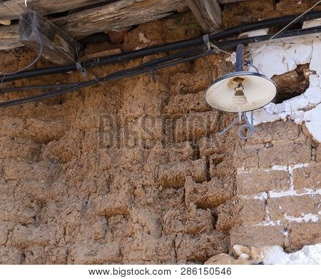 Ruins Of An Old Village House Made Of Adobe Nd Wood