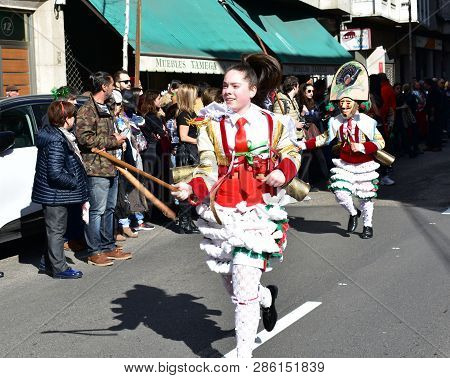 Verin, Spain, 24 Feb 2019. Famous Carnival And Street Parade With Cigarrons Costumes. Ourense Provin