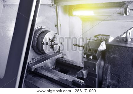 Spindle Chuck And Installed Metal Part On High Precision Cnc Industrial Lathe Turning Machine. Close