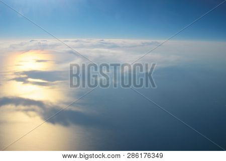 View Above The Earth At The Clouds Below