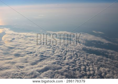 View Above The Earth At The Clouds Below