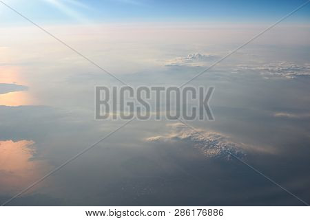 View Above The Earth At The Clouds Below