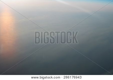 View Above The Earth At The Clouds Below