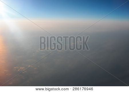 View Above The Earth At The Clouds Below