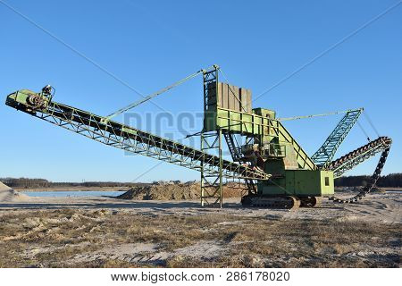 Stone Crusher In The Quarry. Working Mining Machine - Stone Crusher. Quarrying Of Stones For Constru