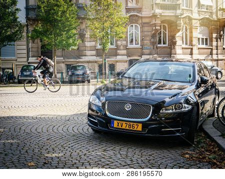 Strasbourg, France - Oct 1, 2017: Jaguar Luxury Black Car Parked On The Colbblestone Of Iconic Place