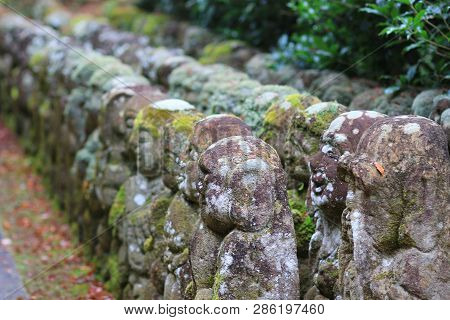 The Stone Of Statues At Rain Day