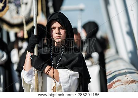 Caceres, Extremadura, Spain - April 08, 2017: The Dominican Brotherhood Of The Holy Christ Of The Vi