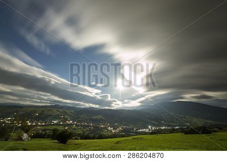Summer Night Mountain Panorama. Green Grassy Mountain Clearing, Spruce Trees On Blue Evening Sky Cop