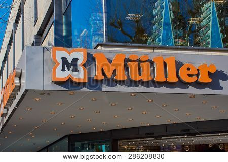 Mainz, Germany - February 25, 2019: Logo Sign Of The Muller Store In Mainz. Muller Ltd. And Co. Kg I