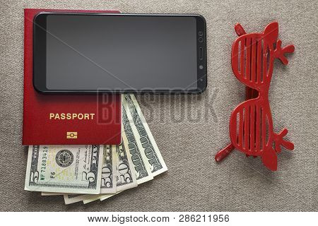 Black Cellphone, Money American Dollars Banknotes Bills, Passport And Toy Funny Sunglasses On Copy S