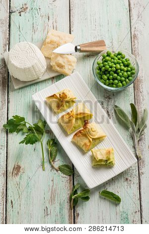 fagottini filled with ricotta parmesan cheese and green peas