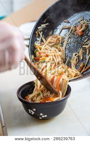 Japanese Ramen Soup With Chicken, Egg, Chives And Sprout On Dark Wooden Background.
