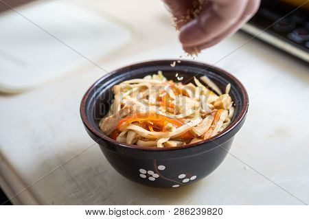 Japanese Ramen Soup With Chicken, Egg, Chives And Sprout On Dark Wooden Background.