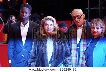  Stephane Bak, Catherine Deneuve, Andre Techine, Lea Mysius  pose at the 'Farewell To The Night' premiere during the 69 Berlinale Festival at Berlinale Palace on February 12, 2019 in Berlin, Germany