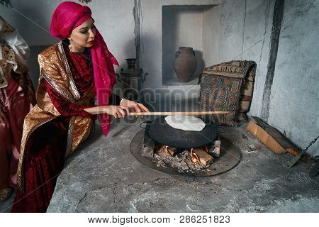 Woman Preparing Or Making Borek Or Bread Dough, Close-up