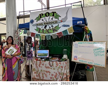 Honolulu - February 10, 2018: Woman Smiles At Potluck With Smooch Booth At The 3rd Annual Hawaii Can