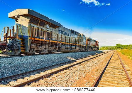 Freight Train Bnsf Railway Companies On A Sunny Day In Arizona.