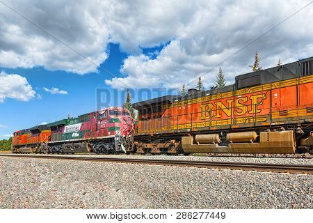 Freight Train Bnsf Railway Companies On A Sunny Day In Arizona.