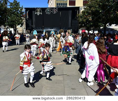 Verin, Spain, 24 Feb 2019. Famous Carnival And Street Parade With Cigarrons Costumes. Ourense Provin