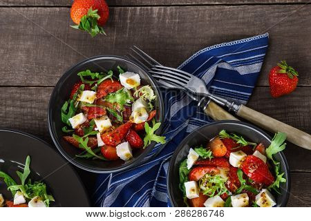 Vegetarian Salad With Strawberry, Tofu And Aragula On Wooden Background Overhead Shot, Summer Lunch 