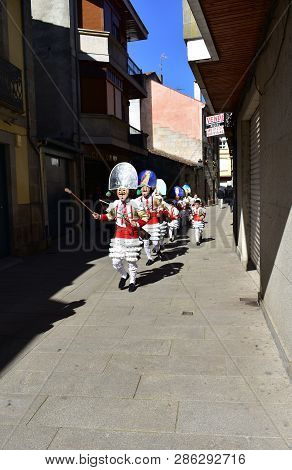 Verin, Spain, 24 Feb 2019. Famous Carnival And Street Parade With Cigarrons Costumes. Ourense Provin