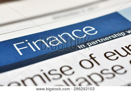 Heading A Finance In The Newpaper. Concept Finance.