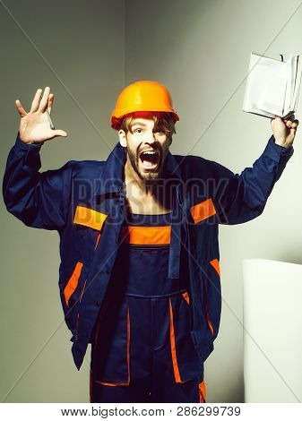 Excited Man Shouting Handsome Builder Repairman Craftsman Foreman Or Construction Worker In Orange H