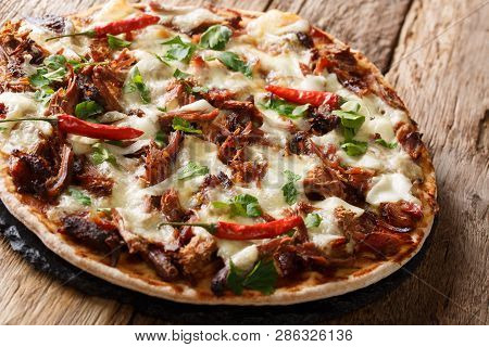 Homemade Pizza With Pulled Pork, Cheese, Pepper And Barbecue Sauce Close-up. Horizontal, Rustic Styl