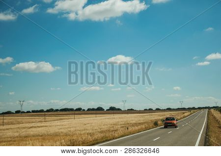 Road Through Rural Landscape And Car Near The Monfrague National Park