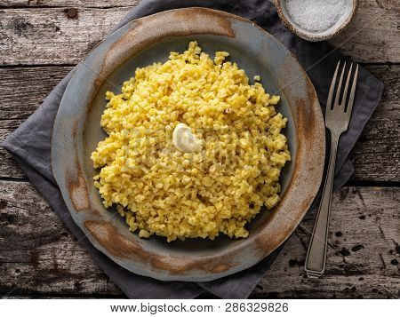 Bulgur Wheat. Boiled Bulghur Cereal In Plate On Dark Old Wooden Table. Healthy Vegetarian Food, Top 