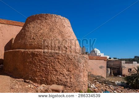 Traditional Oven Used In The Ceramics Production. Oven Is Placed Outdoors, Among The Houses. Bright 
