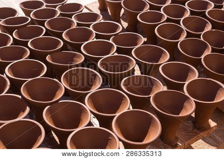 Same Ceramic Products, Stil Raw, Getting Dry On The Sun Outdoors At The Yard Of The Production. Safi