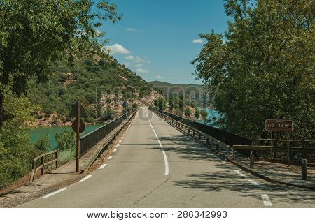 Road Passing Over Bridge On The Tagus River