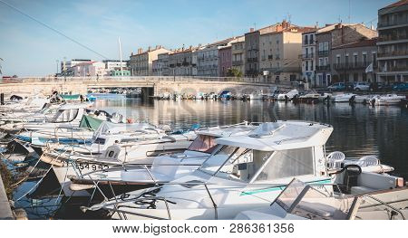 Sete, France - January 4, 2019: View Of The Marina In The City Center Where Pleasure Boats Are Parke